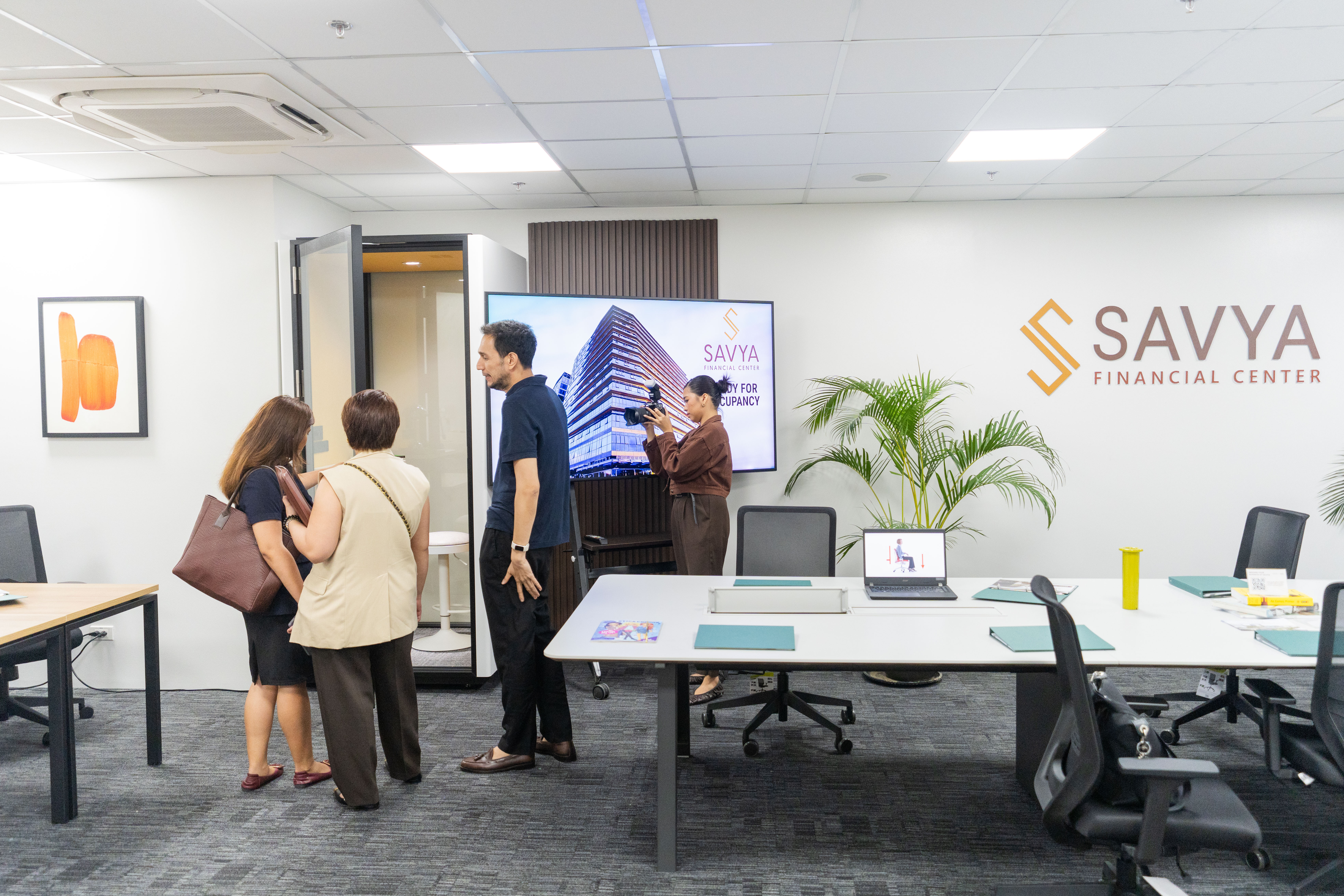 Savya Financial Center Meeting Area with Guests